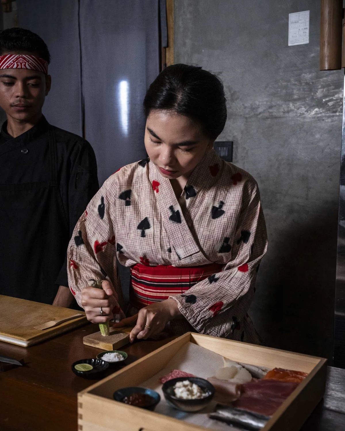 Preparing fresh wasabi tableside at the counter